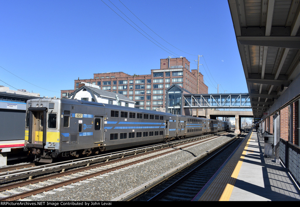 LIRR Train # 6551 arriving into the station with C3 BIlevel Cab Car # 5007 leading 